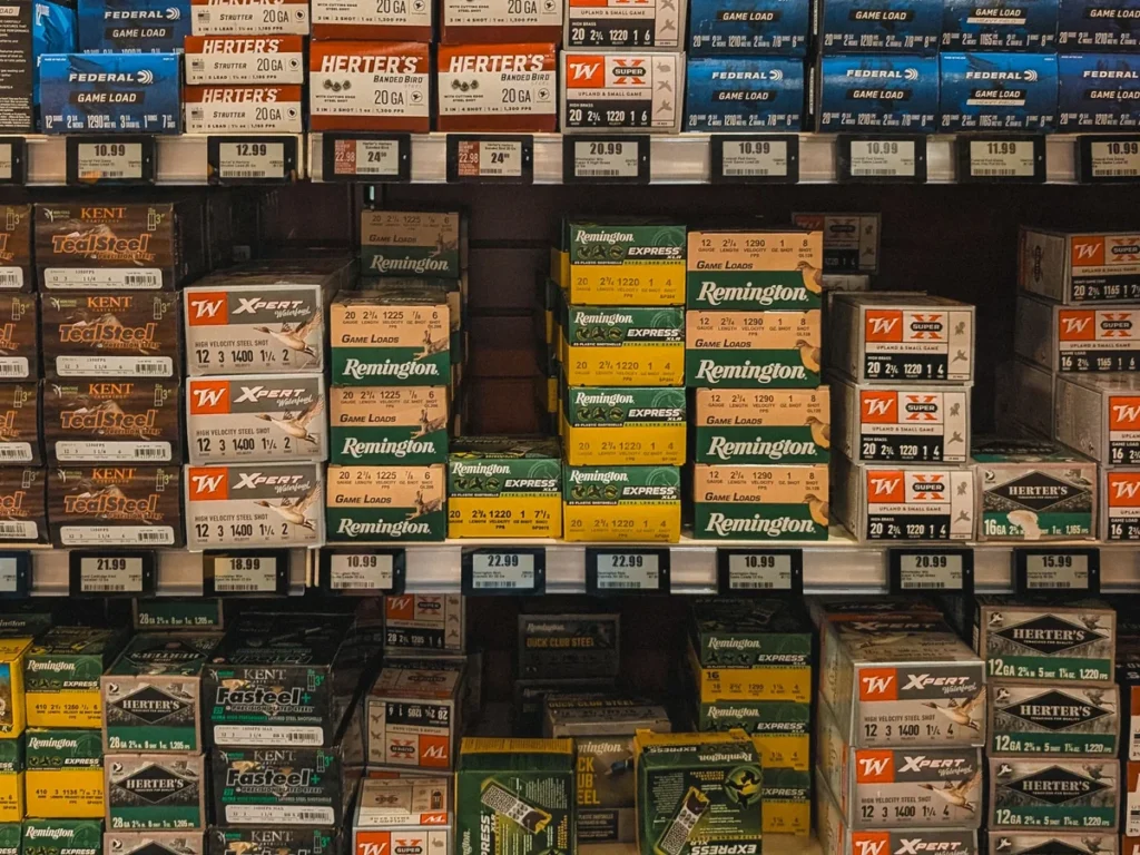 Ammunition boxes organized on gun-store shelves