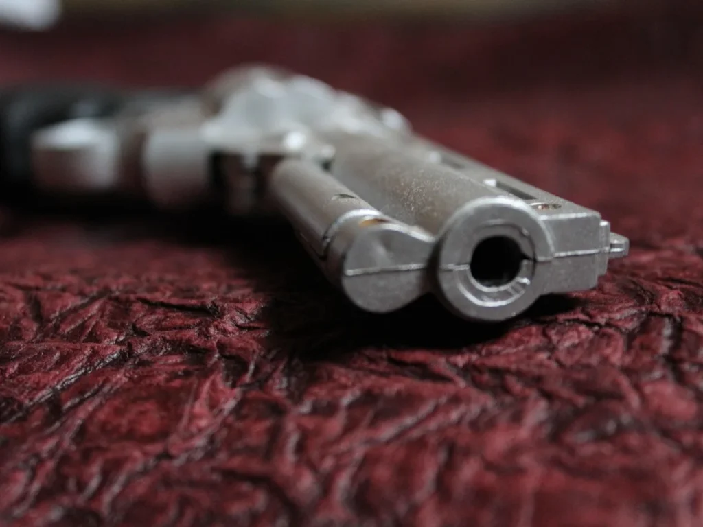Revolver and cartridges on a neutral surface