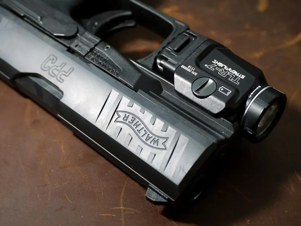 Handgun fitted with a weapon-mounted light