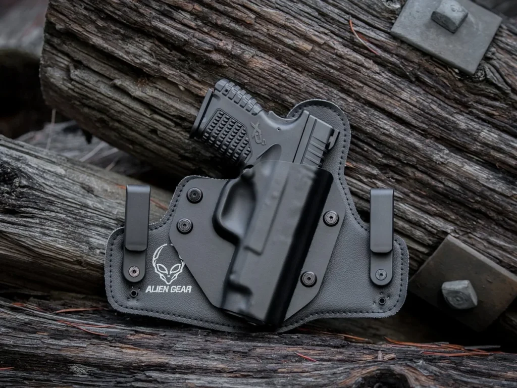 Handgun carried in a leather belt holster